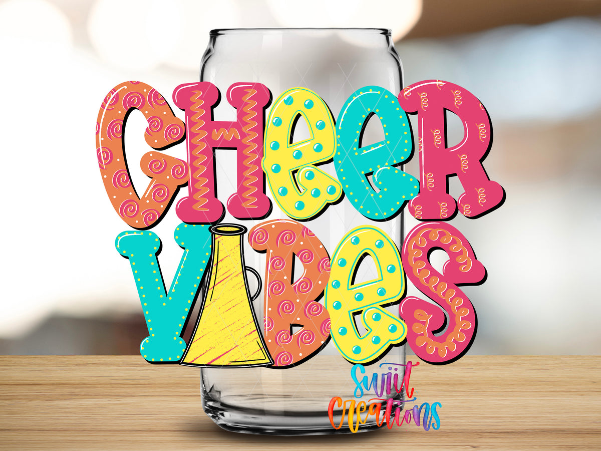 Cheer Vibes design close-up on a clear glass can tumbler