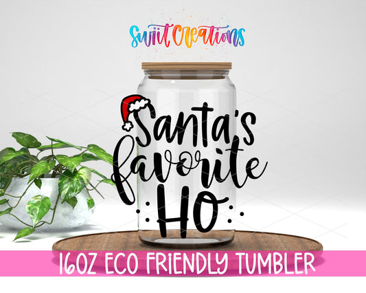 Santa Favorite Ho design on a 16 oz clear glass tumbler with bamboo lid
