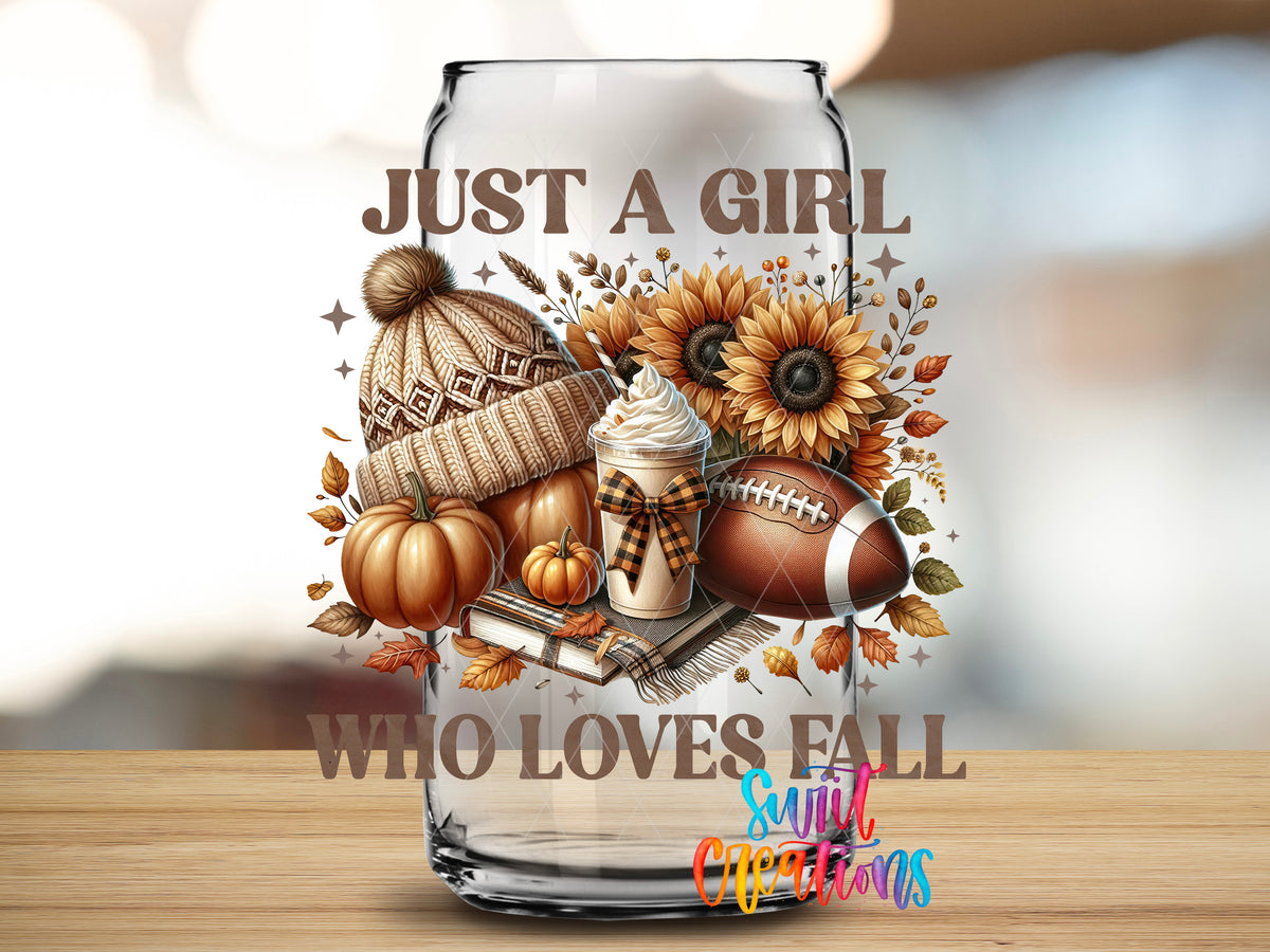 Just a Girl Who Loves Fall design close-up on a clear glass can tumbler