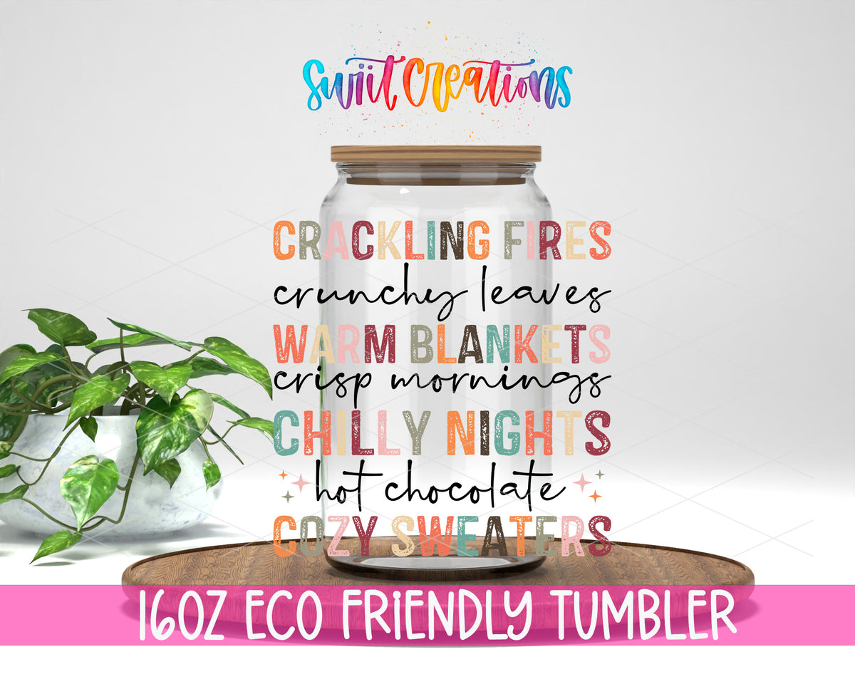 Crackling Fires Cozy Sweaters design on a 16 oz clear glass tumbler with bamboo lid