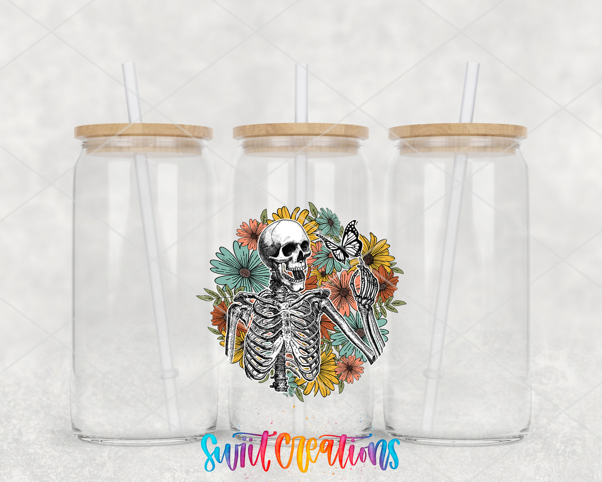 Retro Floral Skeleton clear glass tumbler group mockup with bamboo lids and straws