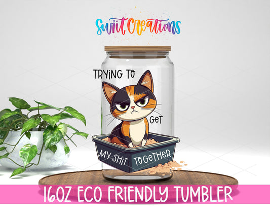 Trying to Get My Shit Together Cat design on a 16 oz clear glass tumbler with bamboo lid