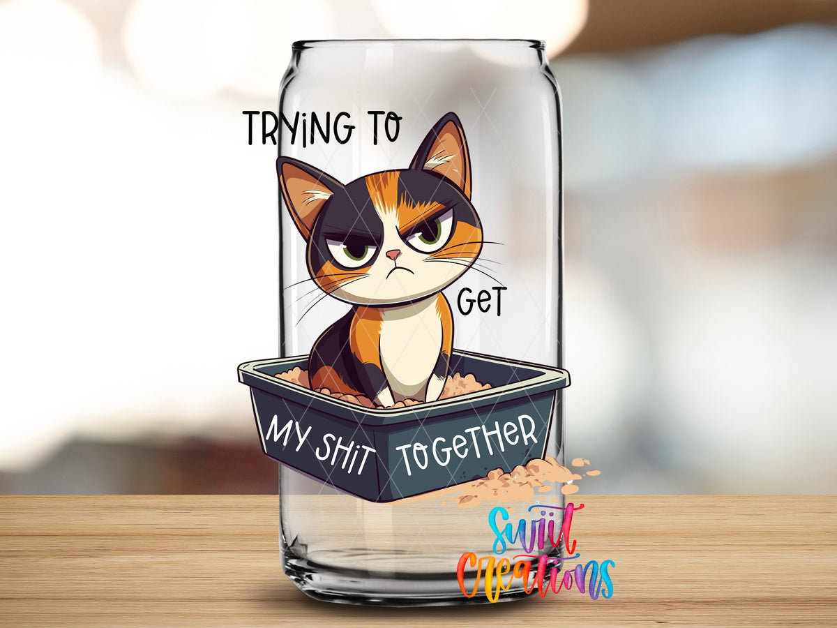 Trying to Get My Shit Together Cat design close-up on a clear glass can tumbler