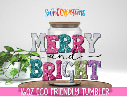 Merry and Bright Sparkle Letters design on a 16 oz clear glass tumbler with bamboo lid