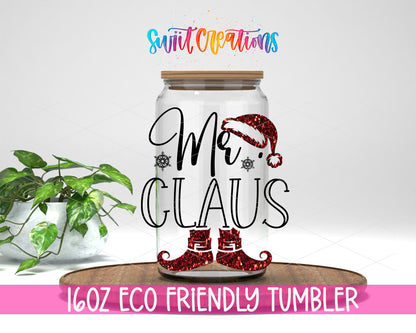 Mr. Claus Christmas design on a 16 oz clear glass tumbler with bamboo lid