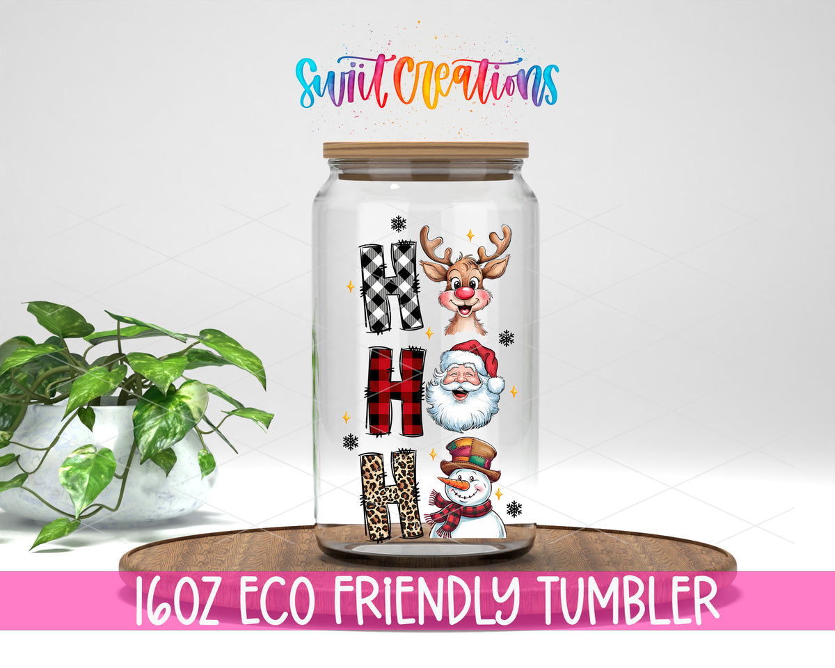 Ho Ho Ho Christmas Characters design on a 16 oz clear glass tumbler with bamboo lid