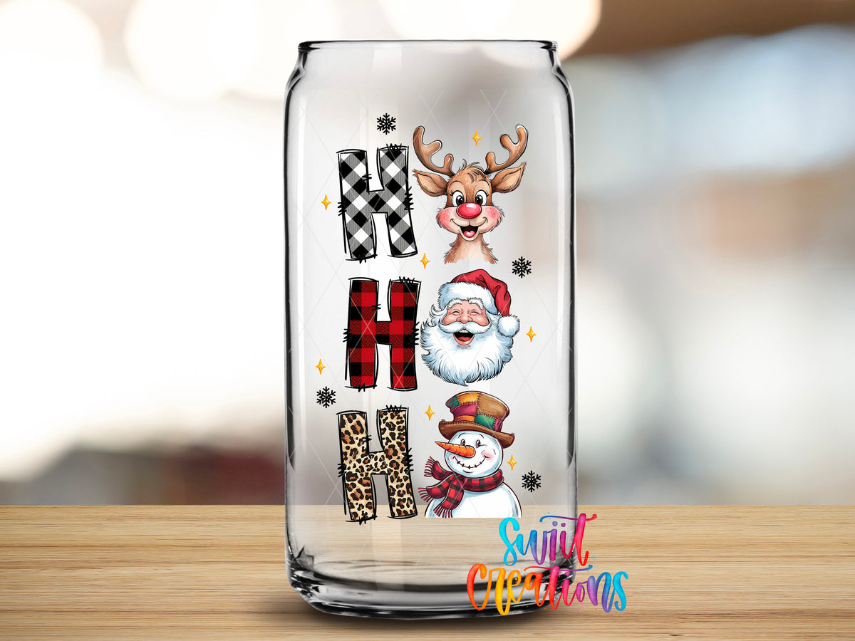 Ho Ho Ho Christmas Characters design close-up on a clear glass can tumbler