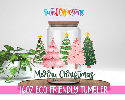Merry Christmas Pink and Green Trees design on a 16 oz clear glass tumbler with bamboo lid