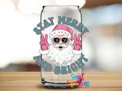 Stay Merry and Bright Santa design close-up on a clear glass can tumbler