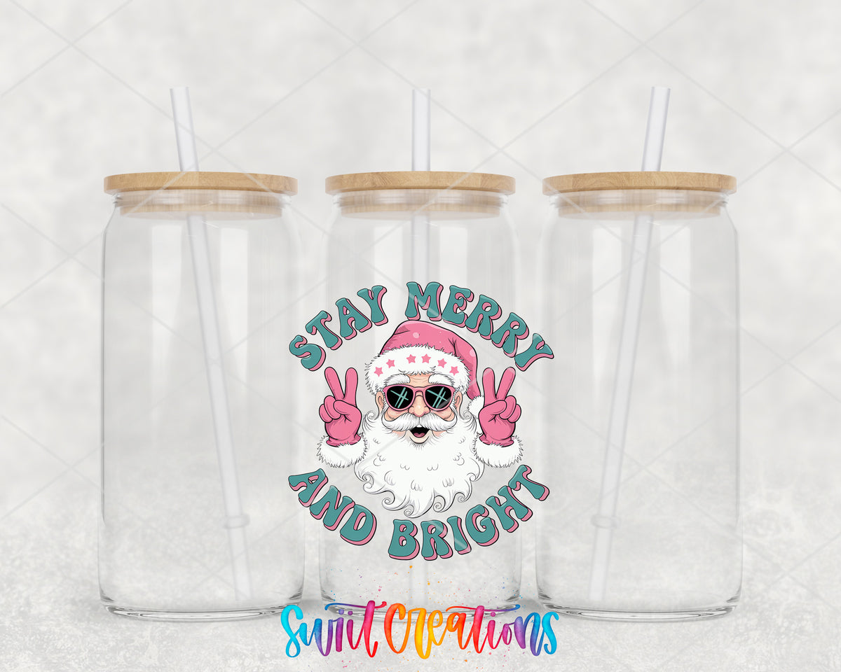 Stay Merry and Bright Santa clear glass tumbler group mockup with bamboo lids and straws