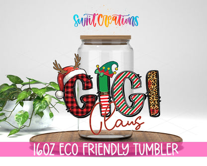 Gigi Claus design on a 16 oz clear glass tumbler with bamboo lid