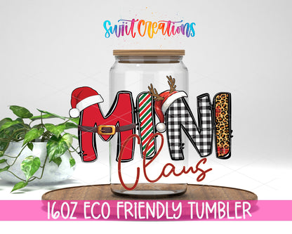 Mini Claus design on a 16 oz clear glass tumbler with bamboo lid
