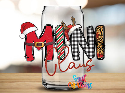 Mini Claus design close-up on a clear glass can tumbler