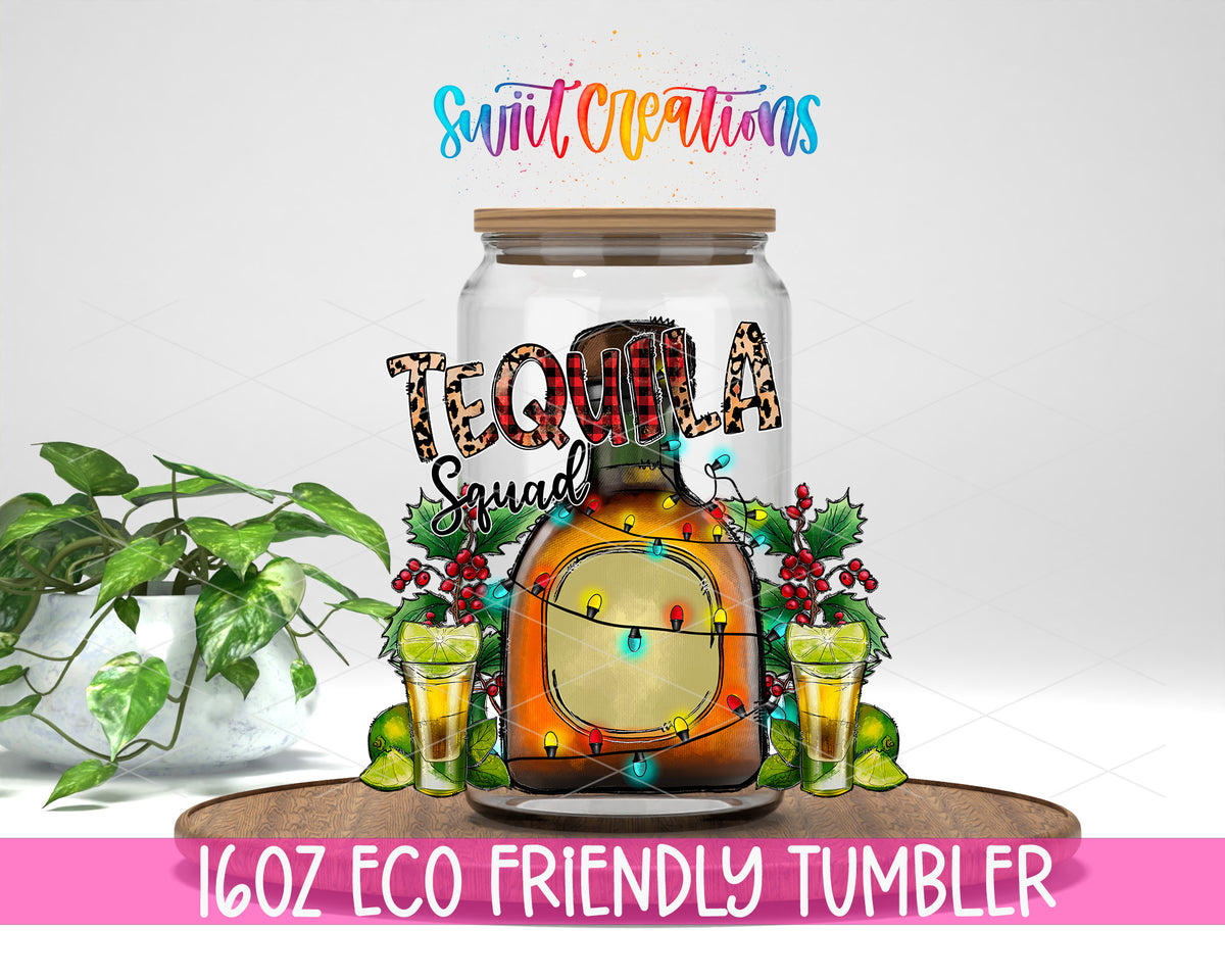 Christmas Tequila Squad design on a 16 oz clear glass tumbler with bamboo lid