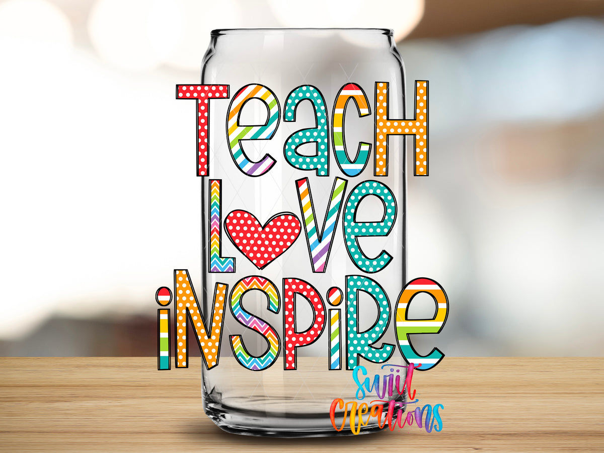 Teach Love Inspire design close-up on a clear glass can tumbler