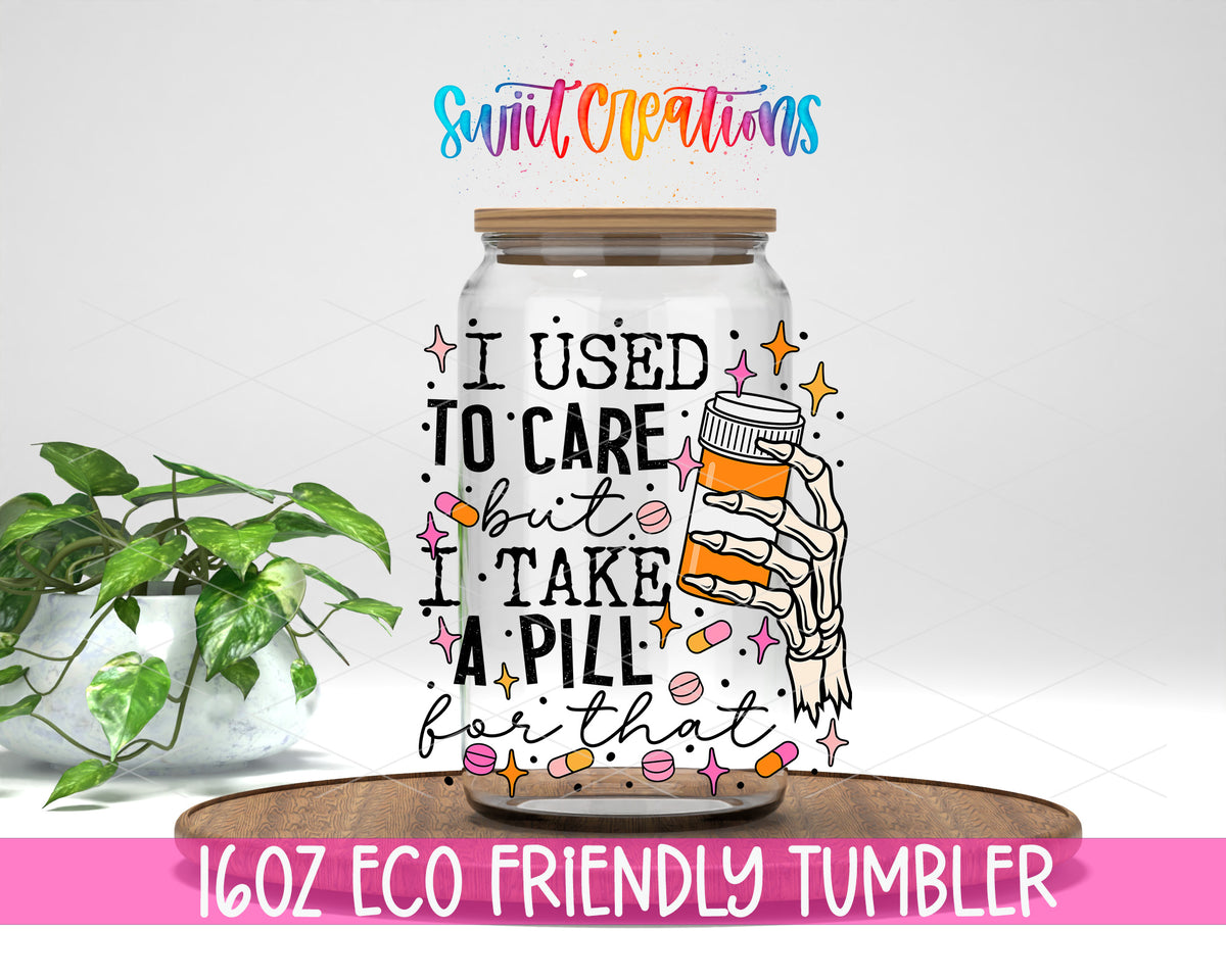 I Used to Care design on a 16 oz clear glass tumbler with bamboo lid