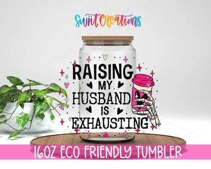 Raising My Husband Is Exhausting design on a 16 oz clear glass tumbler with bamboo lid