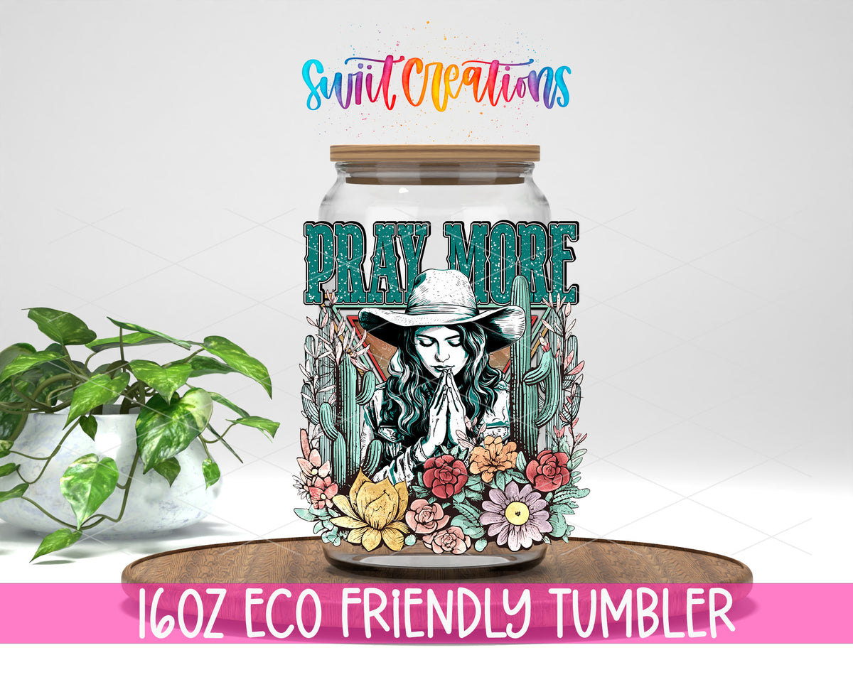 Pray More design on a 16 oz clear glass tumbler with bamboo lid