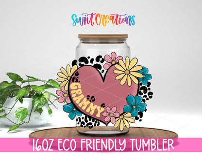Grammy Floral Heart design on a 16 oz clear glass tumbler with bamboo lid