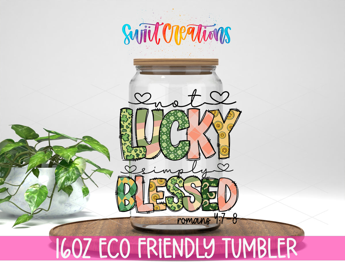 Not Lucky Simply Blessed design on a 16 oz clear glass tumbler with bamboo lid