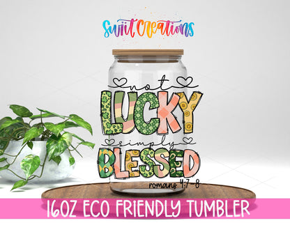 Not Lucky Simply Blessed design on a 16 oz clear glass tumbler with bamboo lid