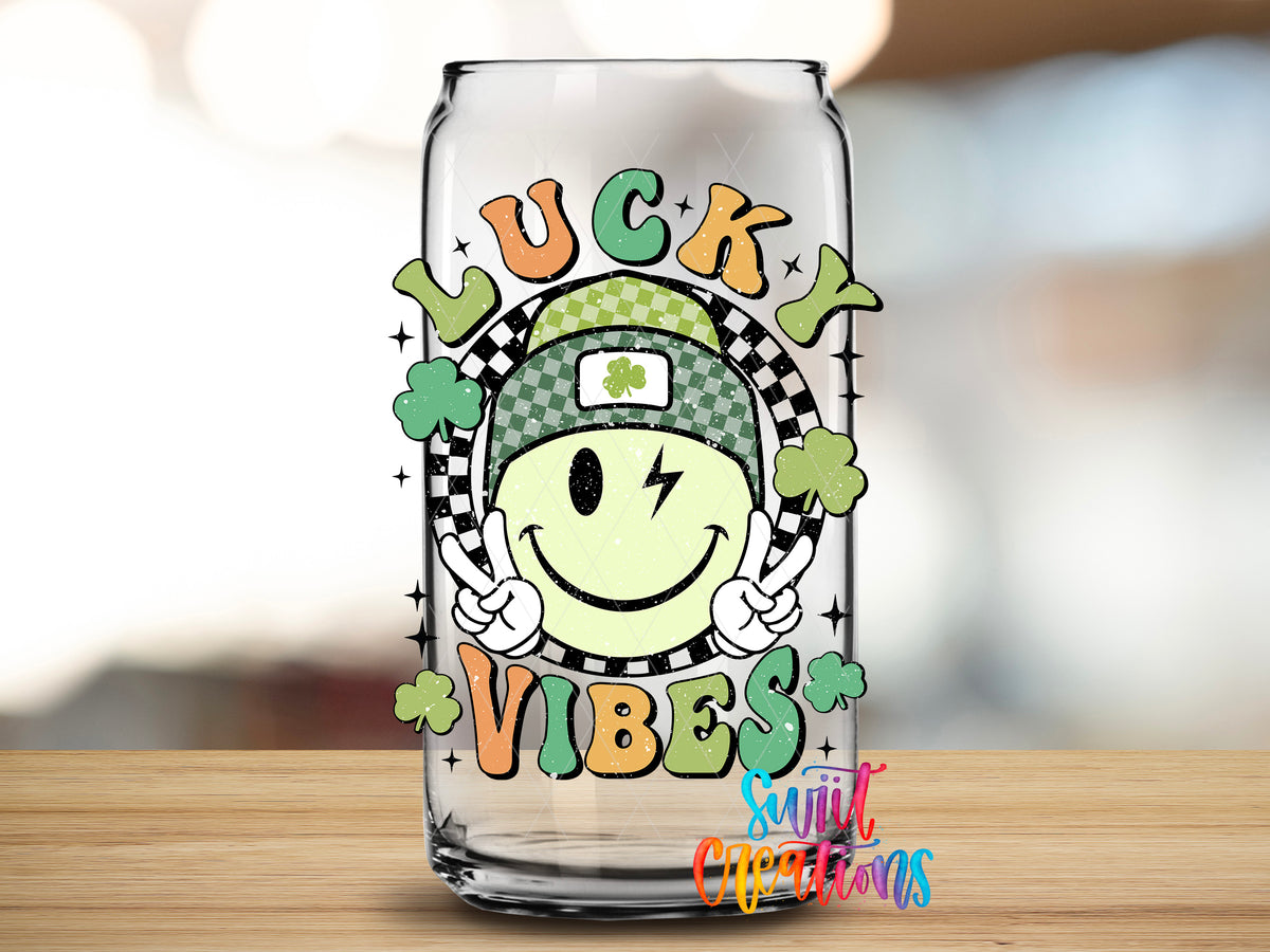 Lucky Vibes design close-up on a clear glass can tumbler