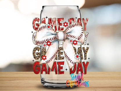 Coquette Baseball Game Day design close-up on a clear glass can tumbler