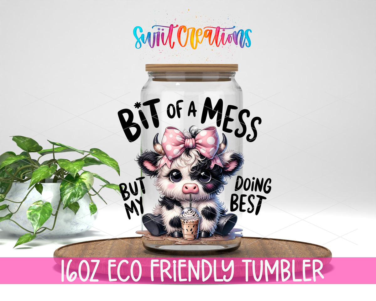 Bit of a Mess Cow design on a 16 oz clear glass tumbler with bamboo lid