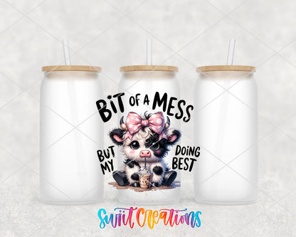 Bit of a Mess Cow frosted glass tumbler group view with lids and straws