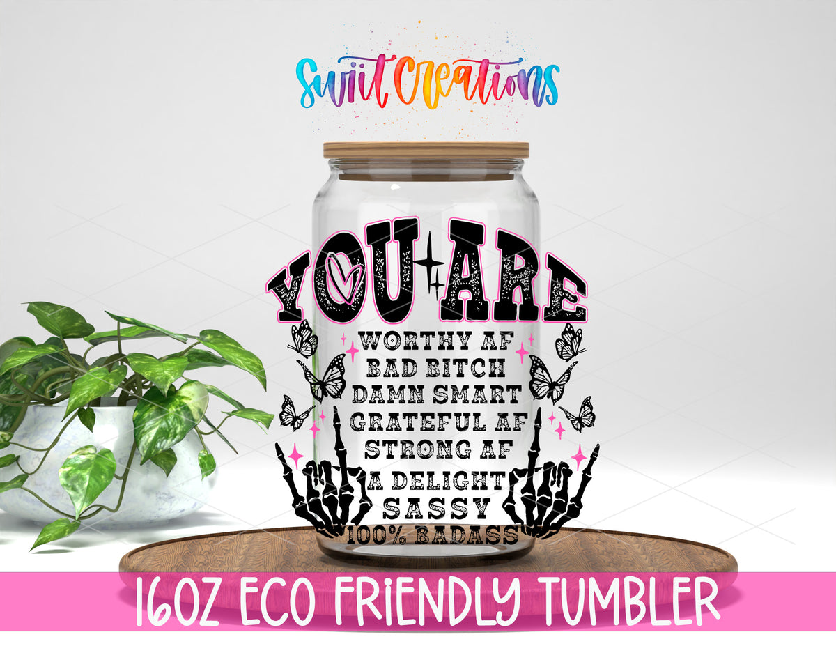 You Are a Badass Affirmation design on a 16 oz clear glass tumbler with bamboo lid
