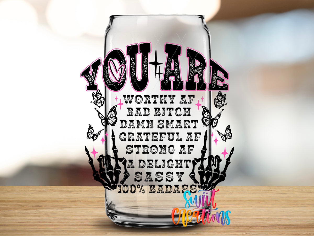 You Are a Badass Affirmation design close-up on a clear glass can tumbler