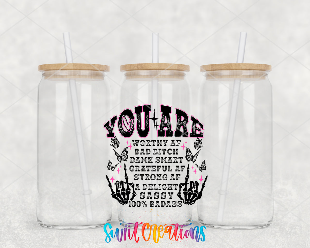 You Are a Badass Affirmation clear glass tumbler group mockup with bamboo lids and straws