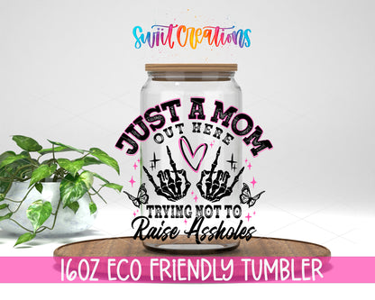 Trying Not to Raise Assholes design on a 16 oz clear glass tumbler with bamboo lid