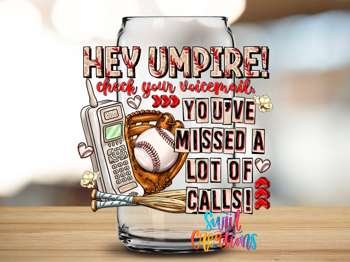 Hey Umpire design close-up on a clear glass can tumbler