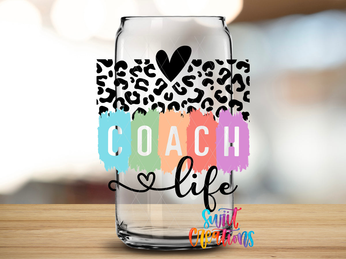 Coach Life Coquette design close-up on a clear glass can tumbler