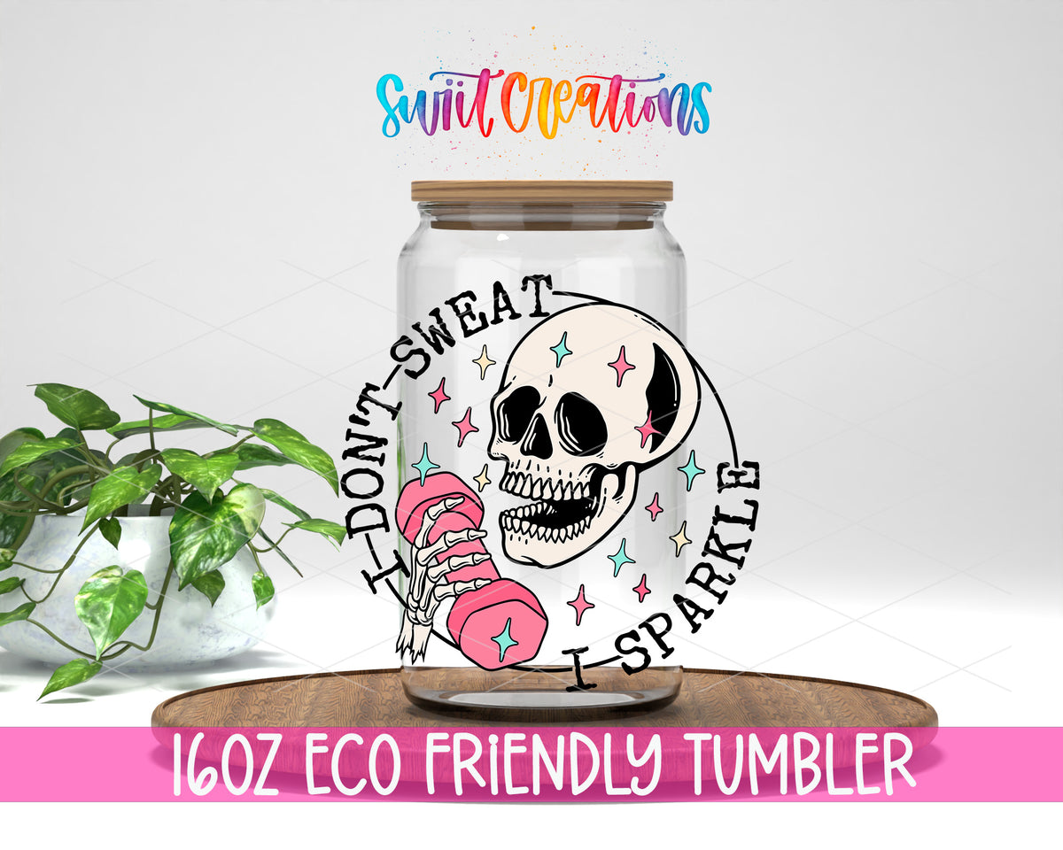 I Don't Sweat I Sparkle design on a 16 oz clear glass tumbler with bamboo lid