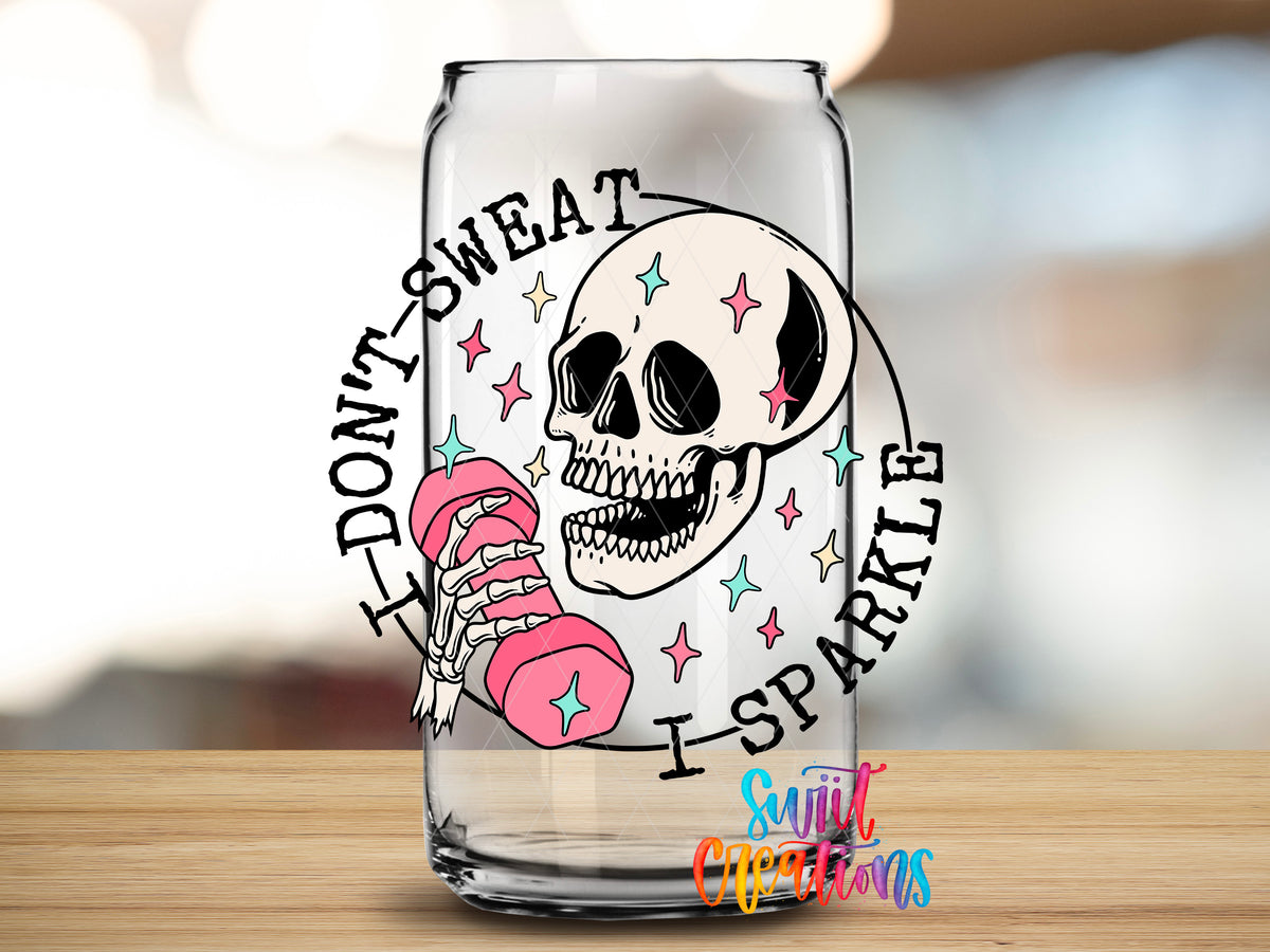 I Don't Sweat I Sparkle design close-up on a clear glass can tumbler