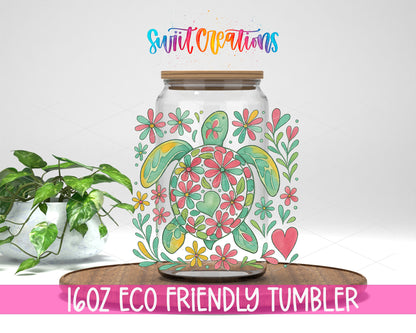 Floral Sea Turtle design on a 16 oz clear glass tumbler with bamboo lid
