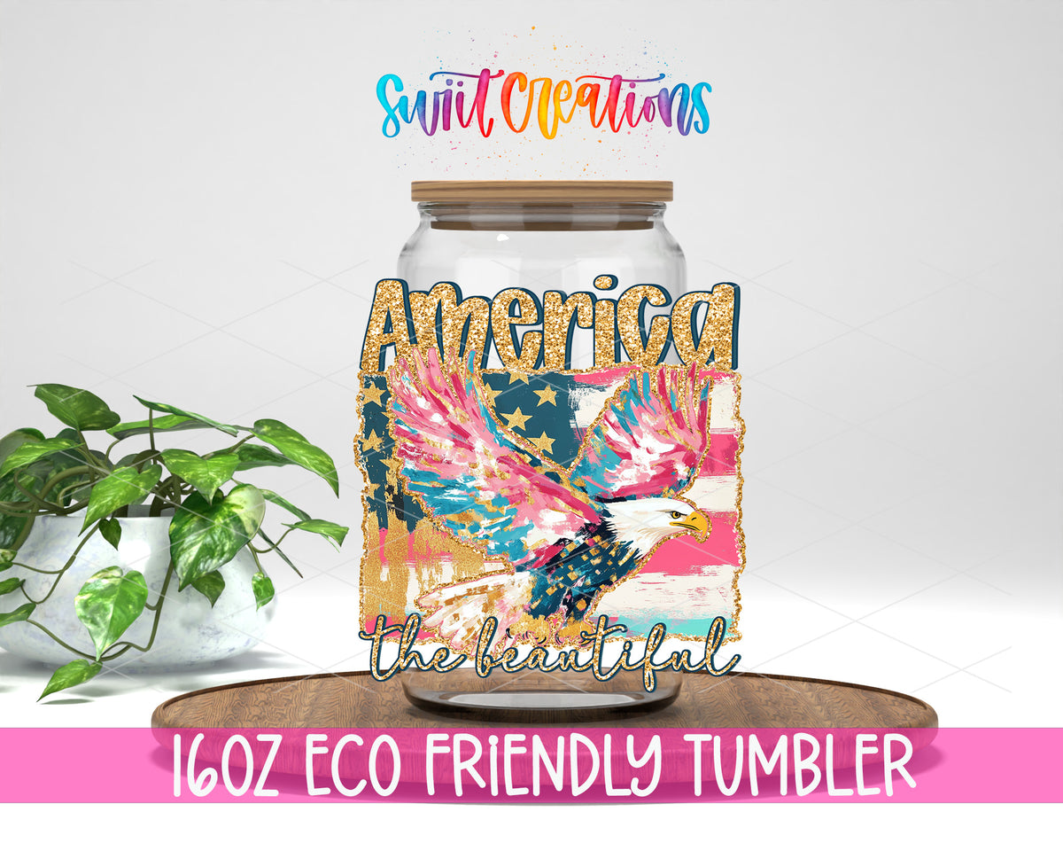 America the Beautiful Eagle design on a 16 oz clear glass tumbler with bamboo lid