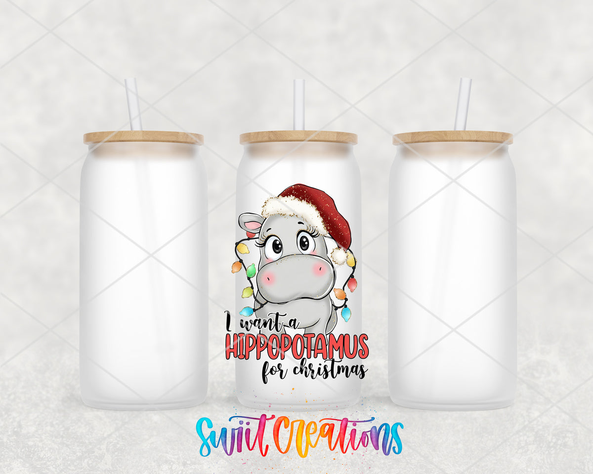 Hippopotamus for Christmas frosted glass tumbler group view with lids and straws