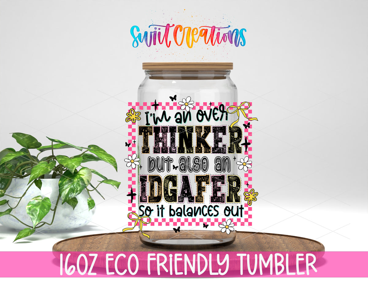 Overthinker and IDGAFer design on a 16 oz clear glass tumbler with bamboo lid