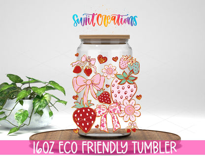 Boho Strawberry Coquette design on a 16 oz clear glass tumbler with bamboo lid