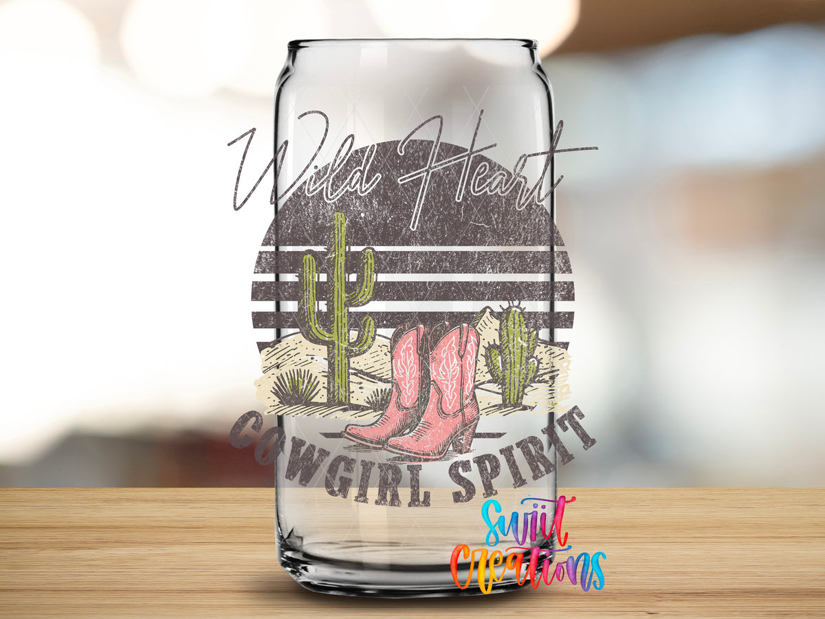 Wild Heart Cowgirl Spirit design close-up on a clear glass can tumbler