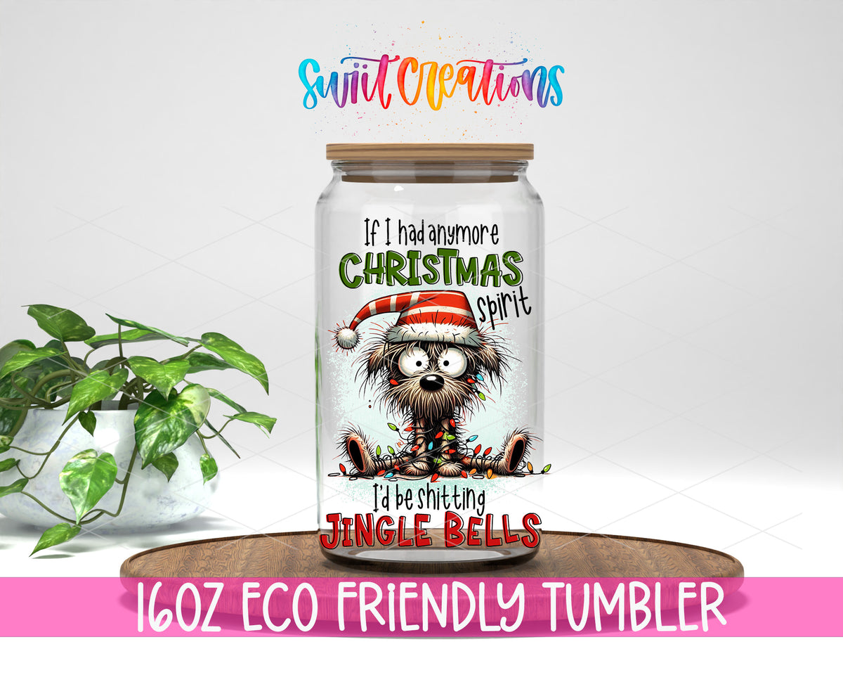 Shitting Jingle Bells design on a 16 oz clear glass tumbler with bamboo lid