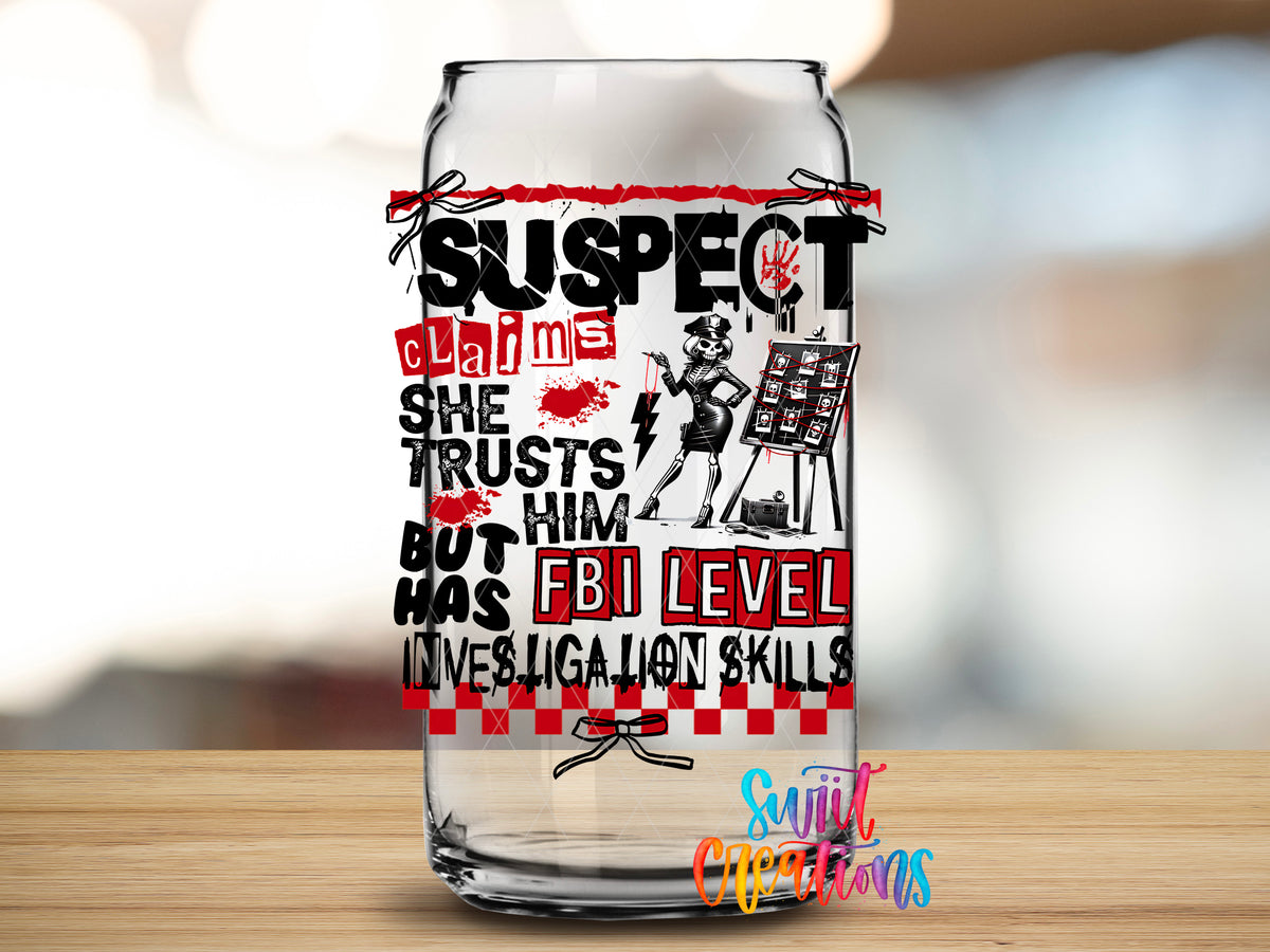 Suspect Has FBI Skills design close-up on a clear glass can tumbler