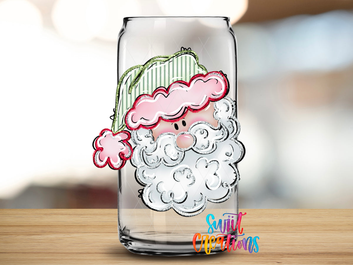 Pastel Santa design close-up on a clear glass can tumbler