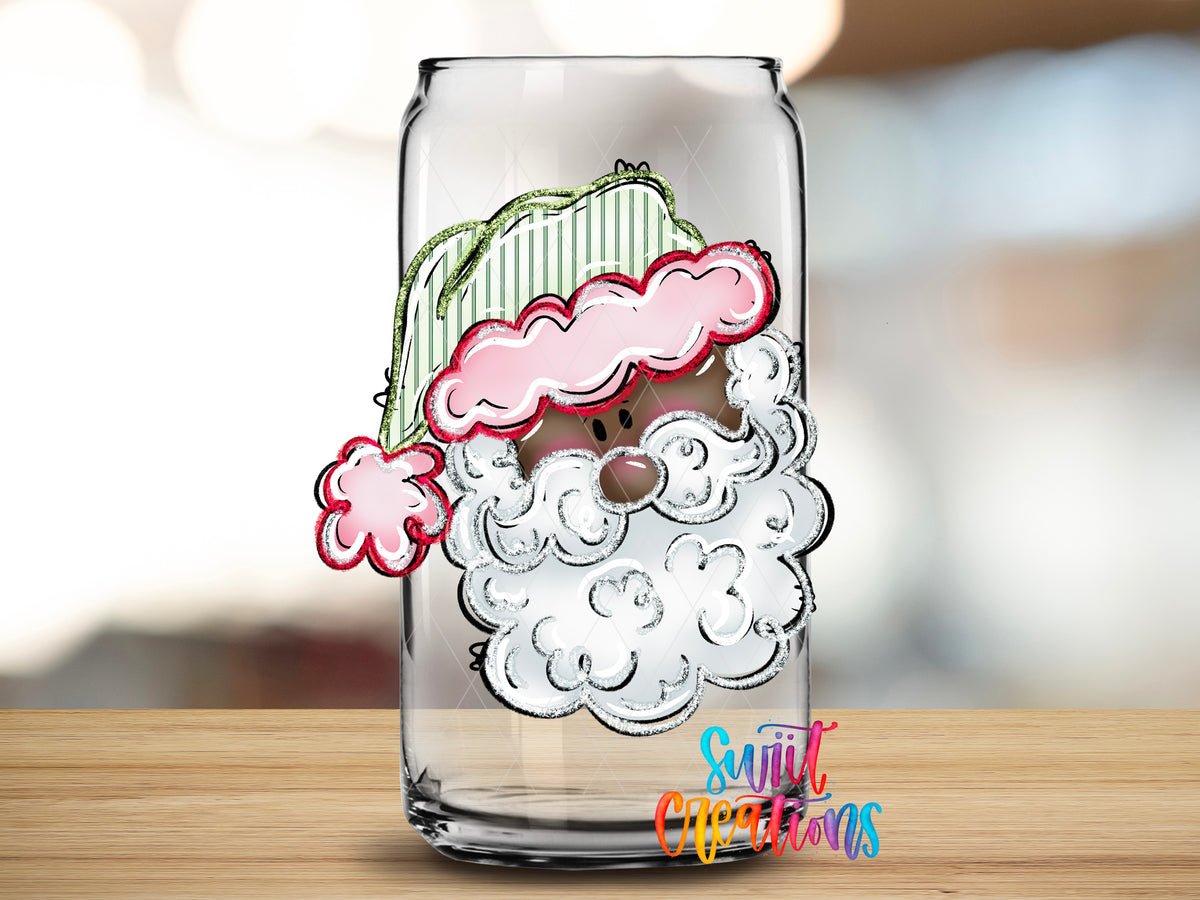 Black Santa design close-up on a clear glass can tumbler