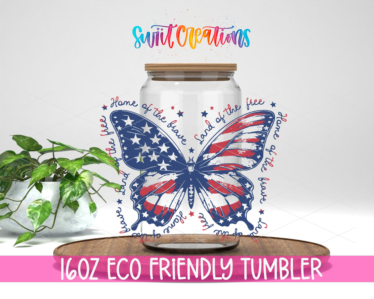 Patriotic Butterfly design on a 16 oz clear glass tumbler with bamboo lid