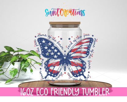Patriotic Butterfly design on a 16 oz clear glass tumbler with bamboo lid