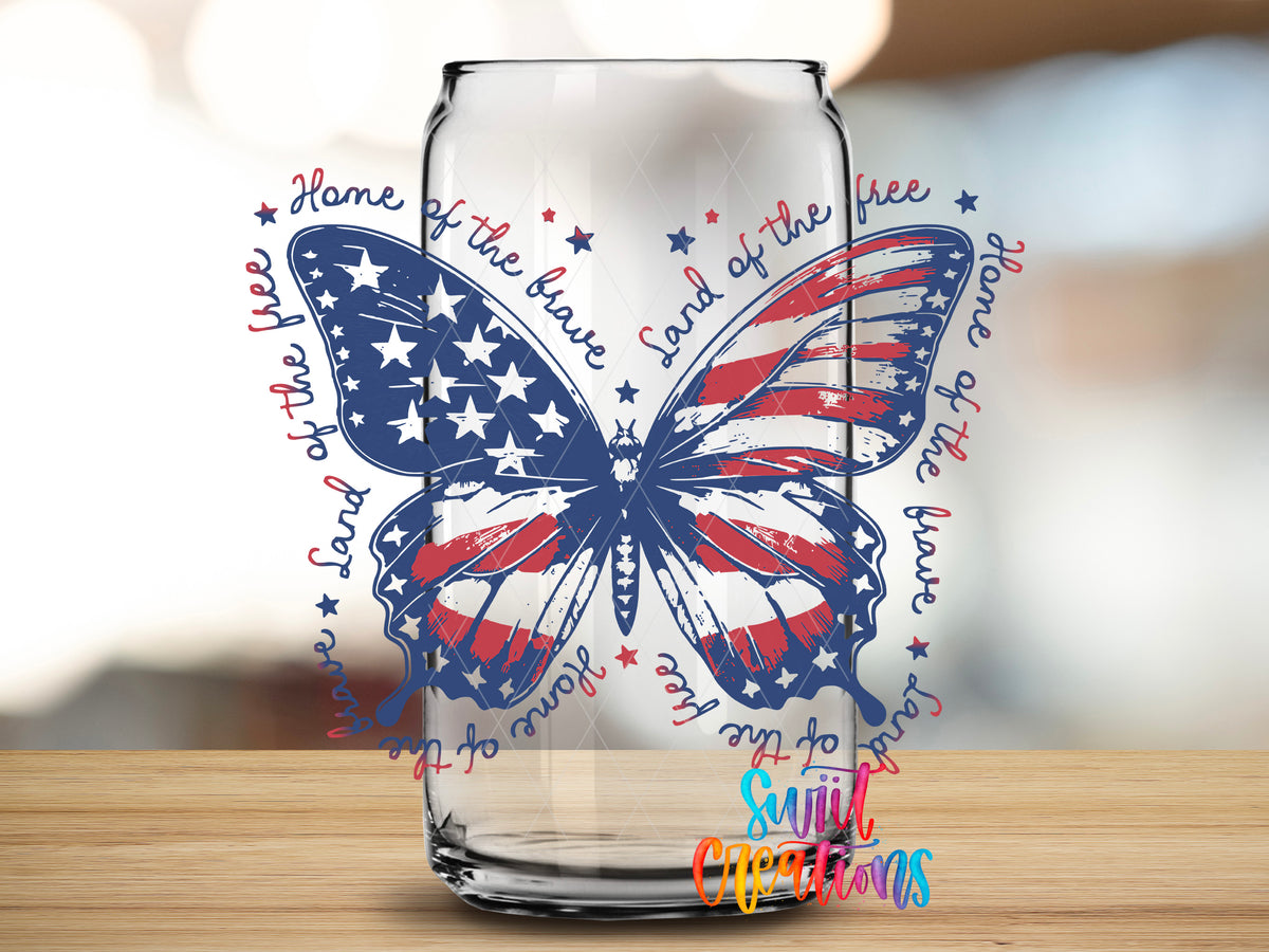 Patriotic Butterfly design close-up on a clear glass can tumbler